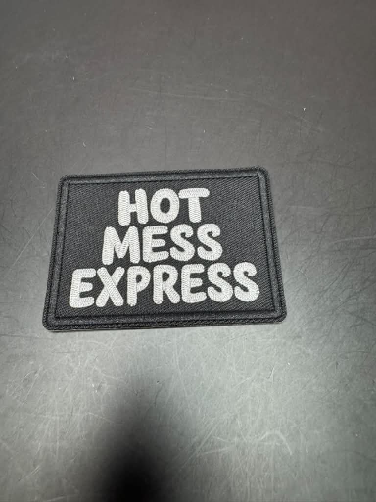 Hot Mess Express White Iron-On Embroidered Patch